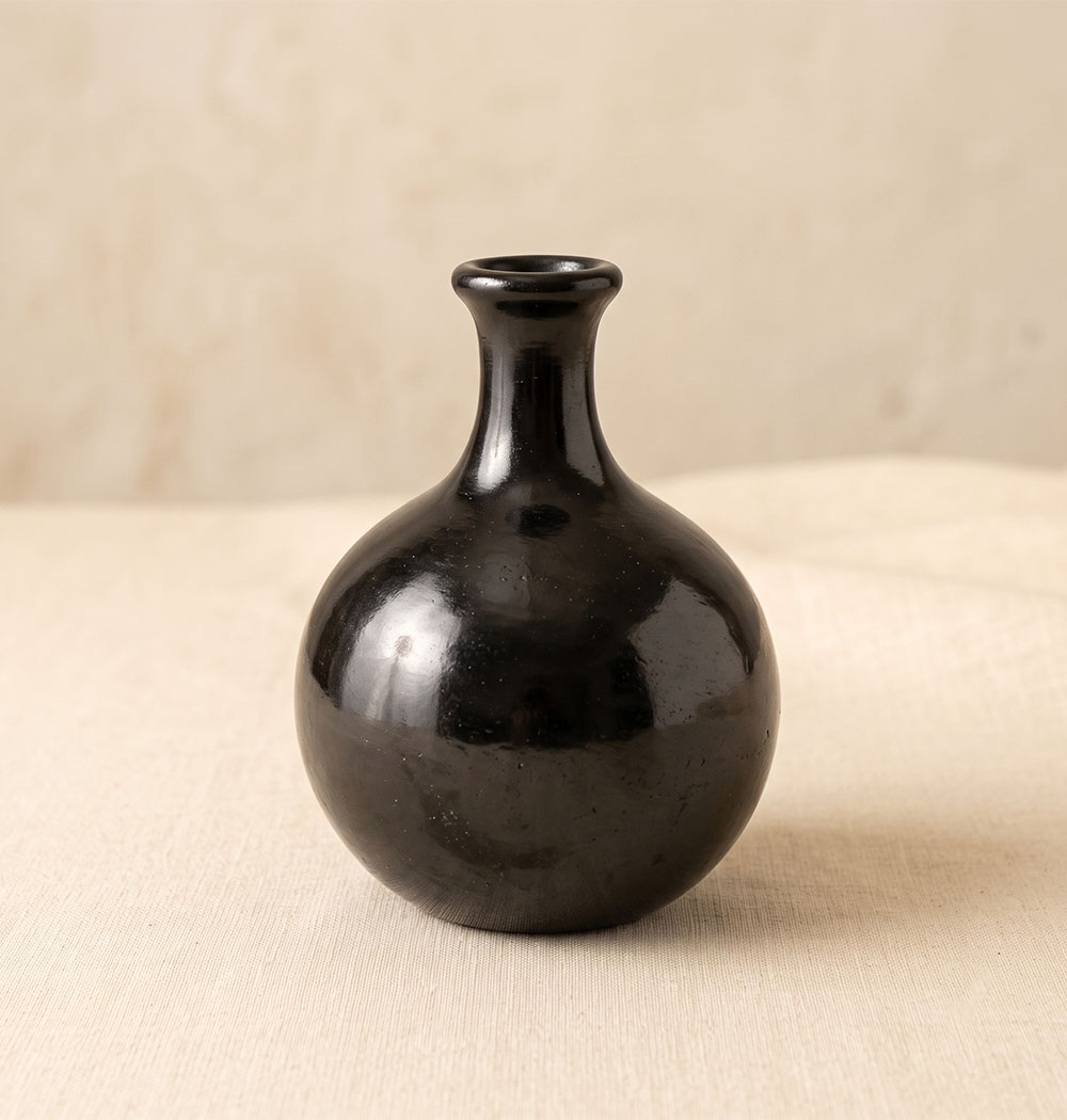 Hand-burnished black clay vessel from San Bartolo Coyotepec, Oaxaca, with a soft matte-to-glossy sheen