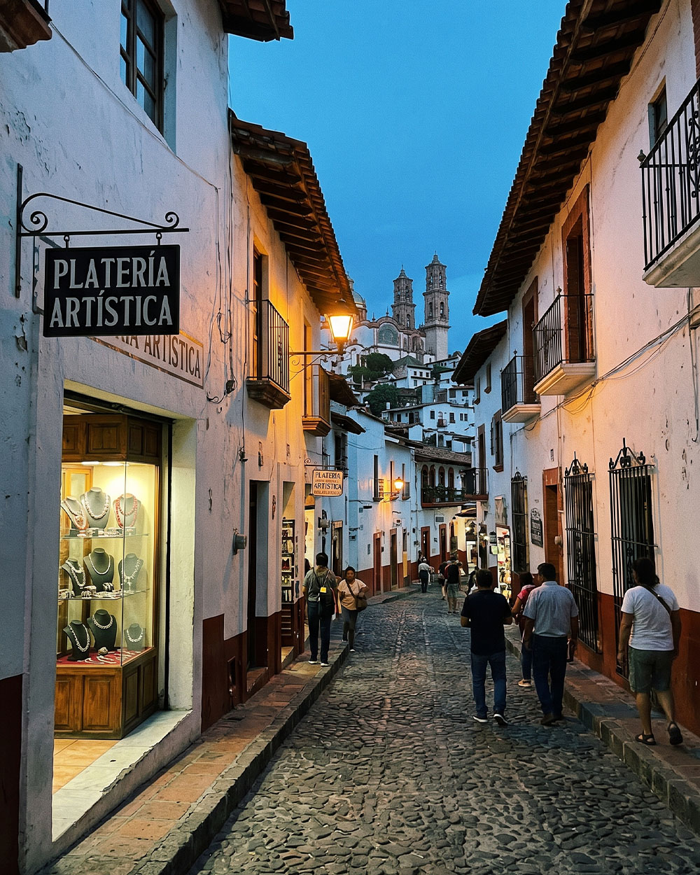 Taxco hillside street with a silver jewelry shop window, Guerrero