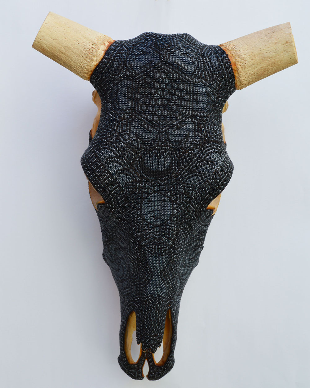 Hand-beaded Huichol artwork with deer and peyote flower motifs from Jalisco and Nayarit, Mexico